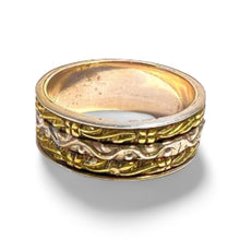 Load image into Gallery viewer, silver and brass spinning meditation ring.  3 rings move around a larger ring
